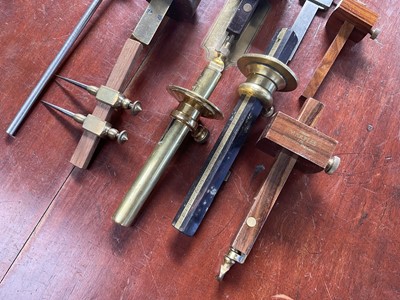 Lot 2401 - Group of mahogany and brass marking scribes gauges and other gauges by various makers including Sorby, Marples and others (1 box).