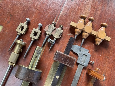 Lot 2401 - Group of mahogany and brass marking scribes gauges and other gauges by various makers including Sorby, Marples and others (1 box).