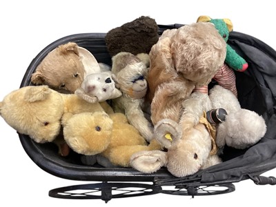 Lot 2644 - Steiff bunny and other bears housed in a vintage pram