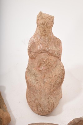 Lot 877 - Ancient pottery votive figure, 11cm high and a fragmentary figure