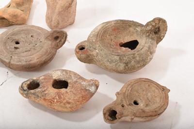 Lot 877 - Ancient pottery votive figure, 11cm high and a fragmentary figure