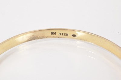 Lot 62 - Four silver/white metal brooches all with enamel decoration, silver and blue enamel bangle and an Art Nouveau style white metal and enamel panel bracelet (6 items)