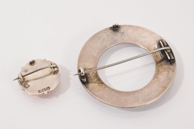 Lot 62 - Four silver/white metal brooches all with enamel decoration, silver and blue enamel bangle and an Art Nouveau style white metal and enamel panel bracelet (6 items)