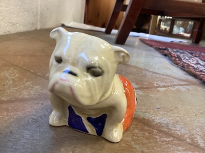 Lot 1106 - Two Royal Doulton bulldogs draped in Union Jack flags