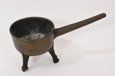 Lot 975 - Bronze skillet, brass ejector candlestick and steel wick trimmers
