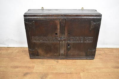 Lot 1532 - Rare Charles II oak two door mural cupboard