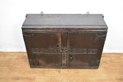 Lot 1532 - Rare Charles II oak two door mural cupboard
