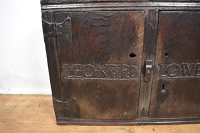 Lot 1532 - Rare Charles II oak two door mural cupboard