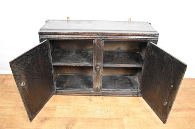 Lot 1532 - Rare Charles II oak two door mural cupboard