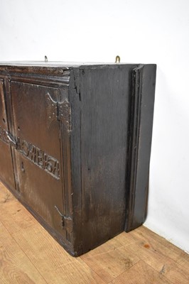 Lot 1532 - Rare Charles II oak two door mural cupboard