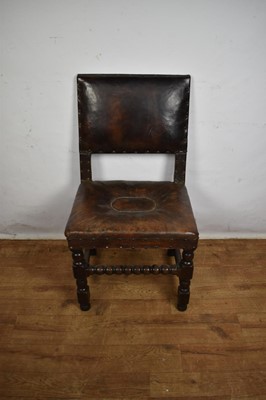 Lot 1536 - Carolean leather upholstered oak side chair, together with an ash and elm Windsor chair