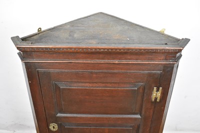 Lot 1538 - George III oak corner cupboard