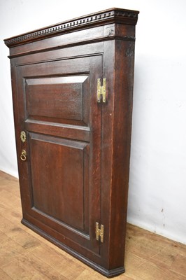 Lot 1538 - George III oak corner cupboard