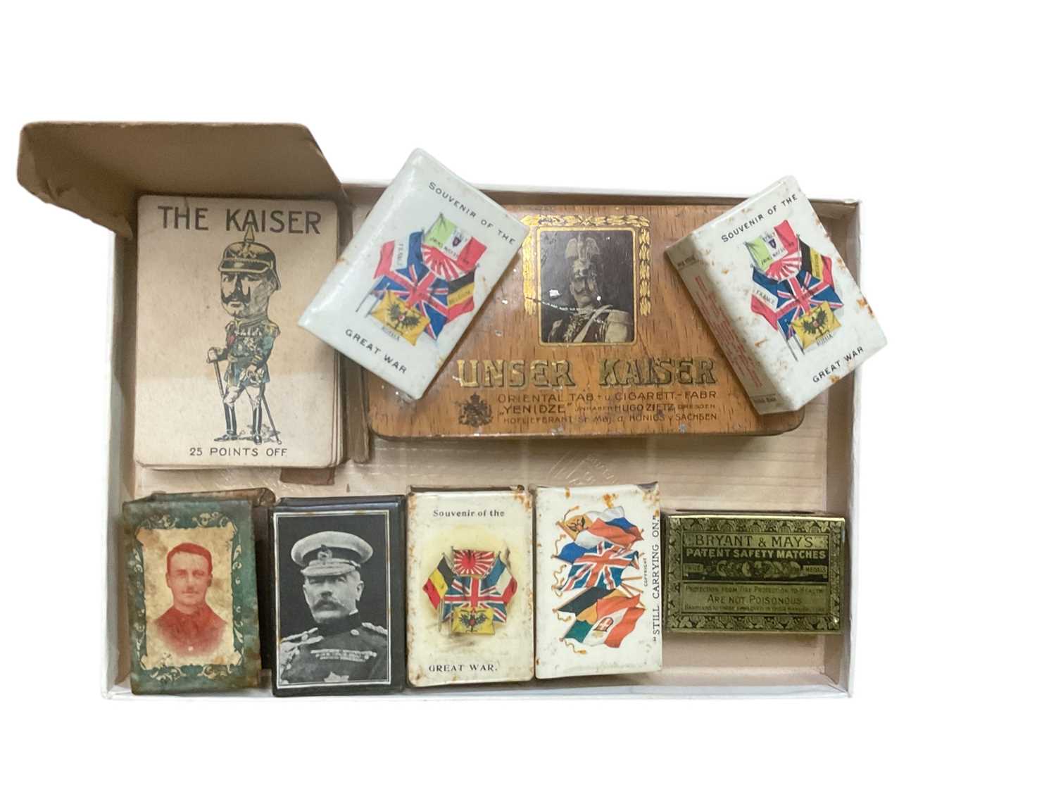 Lot 812 - Group of six First World War related matchbook covers, together with a First World War card game and related tins.