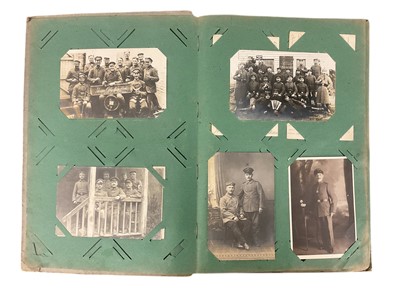 Lot 839 - First World War Imperial German military Postcard album containing 22 postcards of groups of German Soldiers, some dated 1916