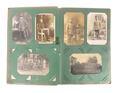 Lot 839 - First World War Imperial German military Postcard album containing 22 postcards of groups of German Soldiers, some dated 1916