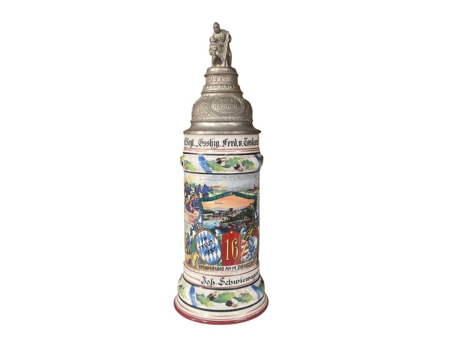 Lot 845 - Imperial German military porcelain stein with hinged pewter lid with soldier with wounded and lion mounts, transfer and painted military decoration named to ' Joh.Schwiewager, Kyle.hay.16.Inft.R...