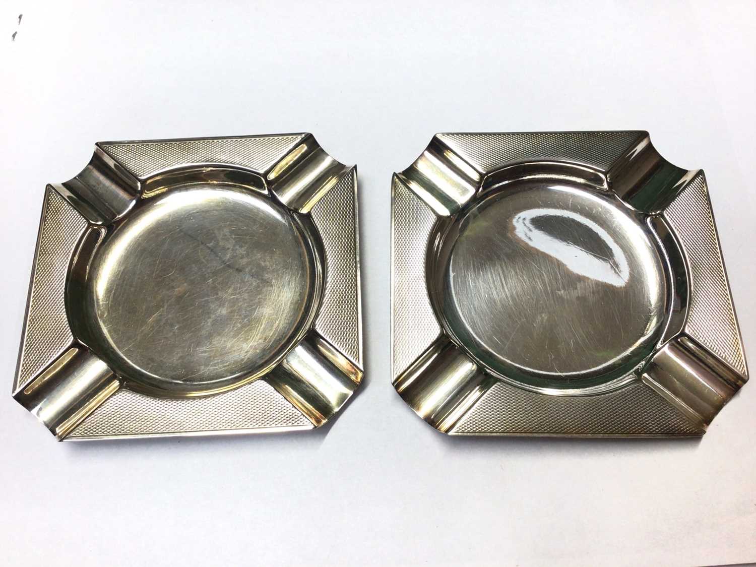 Lot 1000 - Pair of 1930s Mappin & Webb silver ashtrays