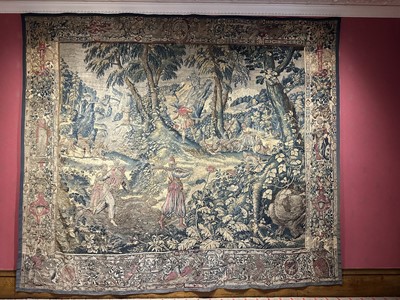 Lot 1722 - A late 16th century Flemish tapestry worked with bear hunting scenes in a mountainous forest