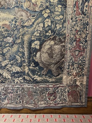 Lot 1722 - A late 16th century Flemish tapestry worked with bear hunting scenes in a mountainous forest