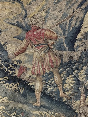 Lot 1722 - A late 16th century Flemish tapestry worked with bear hunting scenes in a mountainous forest