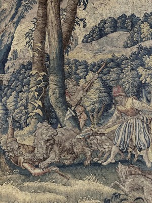 Lot 1722 - A late 16th century Flemish tapestry worked with bear hunting scenes in a mountainous forest