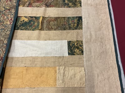 Lot 1722 - A late 16th century Flemish tapestry worked with bear hunting scenes in a mountainous forest