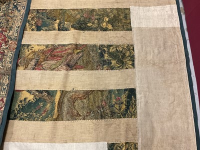 Lot 1722 - A late 16th century Flemish tapestry worked with bear hunting scenes in a mountainous forest