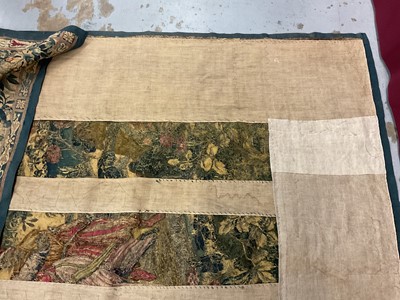 Lot 1722 - A late 16th century Flemish tapestry worked with bear hunting scenes in a mountainous forest