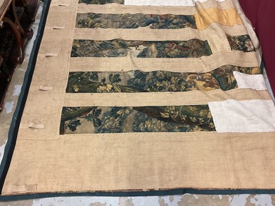 Lot 1722 - A late 16th century Flemish tapestry worked with bear hunting scenes in a mountainous forest