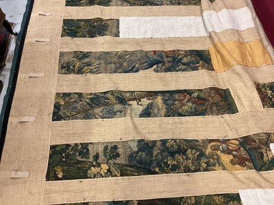Lot 1722 - A late 16th century Flemish tapestry worked with bear hunting scenes in a mountainous forest