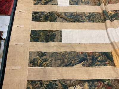 Lot 1722 - A late 16th century Flemish tapestry worked with bear hunting scenes in a mountainous forest