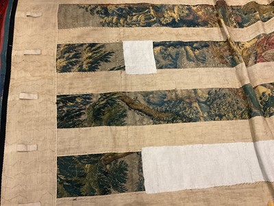 Lot 1722 - A late 16th century Flemish tapestry worked with bear hunting scenes in a mountainous forest