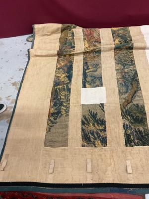 Lot 1722 - A late 16th century Flemish tapestry worked with bear hunting scenes in a mountainous forest