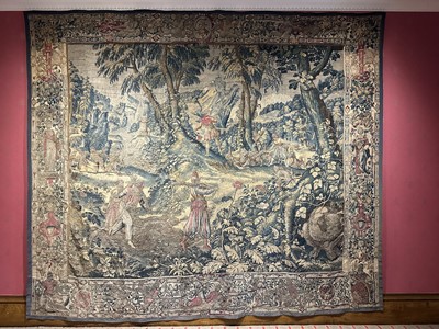 Lot 1722 - A late 16th century Flemish tapestry worked with bear hunting scenes in a mountainous forest