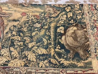 Lot 1722 - A late 16th century Flemish tapestry worked with bear hunting scenes in a mountainous forest