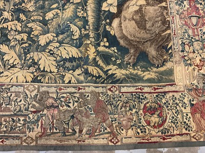 Lot 1722 - A late 16th century Flemish tapestry worked with bear hunting scenes in a mountainous forest