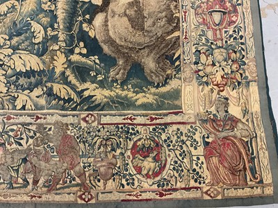 Lot 1722 - A late 16th century Flemish tapestry worked with bear hunting scenes in a mountainous forest