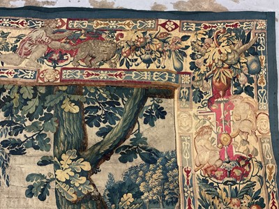 Lot 1722 - A late 16th century Flemish tapestry worked with bear hunting scenes in a mountainous forest