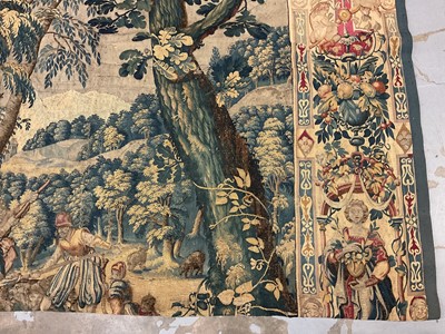 Lot 1722 - A late 16th century Flemish tapestry worked with bear hunting scenes in a mountainous forest