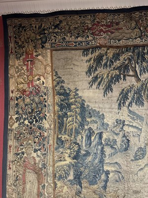 Lot 1722 - A late 16th century Flemish tapestry worked with bear hunting scenes in a mountainous forest