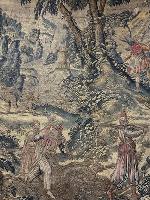 Lot 1722 - A late 16th century Flemish tapestry worked with bear hunting scenes in a mountainous forest