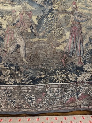 Lot 1722 - A late 16th century Flemish tapestry worked with bear hunting scenes in a mountainous forest