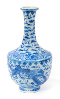 Lot 73 - Chinese blue and white bottle vase painted with dragons