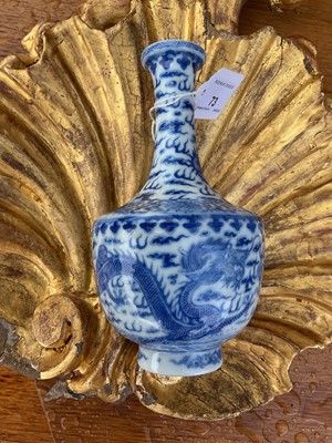 Lot 73 - Chinese blue and white bottle vase painted with dragons