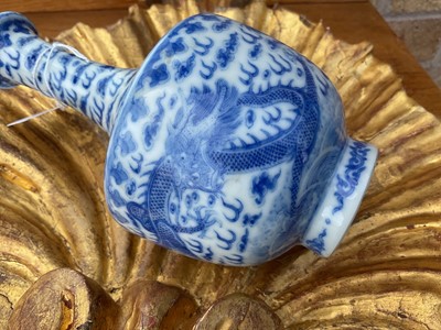 Lot 73 - Chinese blue and white bottle vase painted with dragons