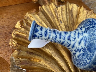 Lot 73 - Chinese blue and white bottle vase painted with dragons