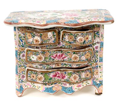 Lot 77 - Continental tin glazed miniature chest of drawers