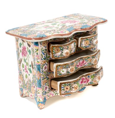 Lot 77 - Continental tin glazed miniature chest of drawers