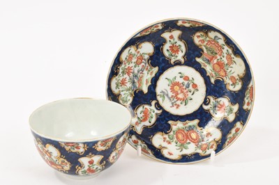 Lot 71 - Worcester slop bowl and stand, circa 1770, painted in the Thunder and Lightning pattern, the bowl with double-ring mark to base, the stand 19cm diameter